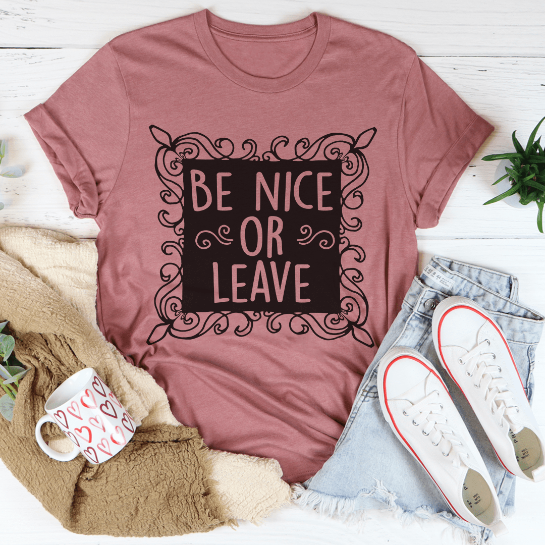 Be Nice Or Leave T-Shirt made from soft ring-spun cotton, featuring double stitching for durability and a bold printed message.