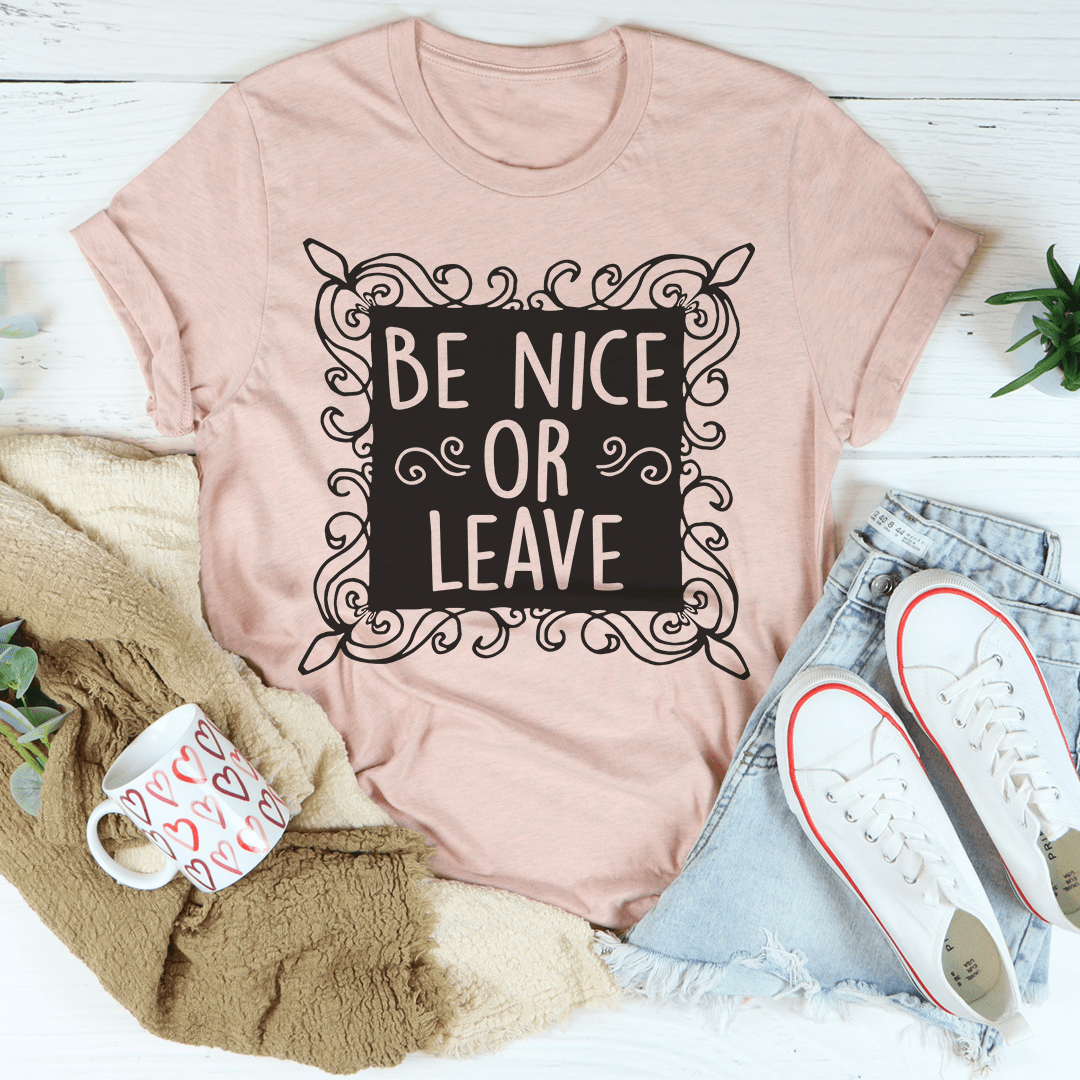 Be Nice Or Leave T-Shirt made from soft ring-spun cotton, featuring double stitching for durability and a bold printed message.