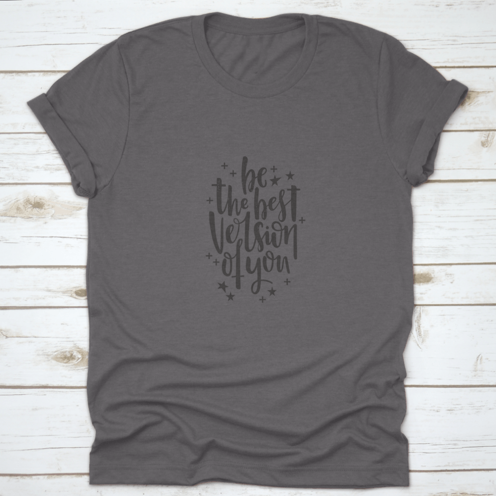 A stylish t-shirt featuring hand-drawn lettering that reads 'Be The Best Version Of You', made from soft cotton fabric.