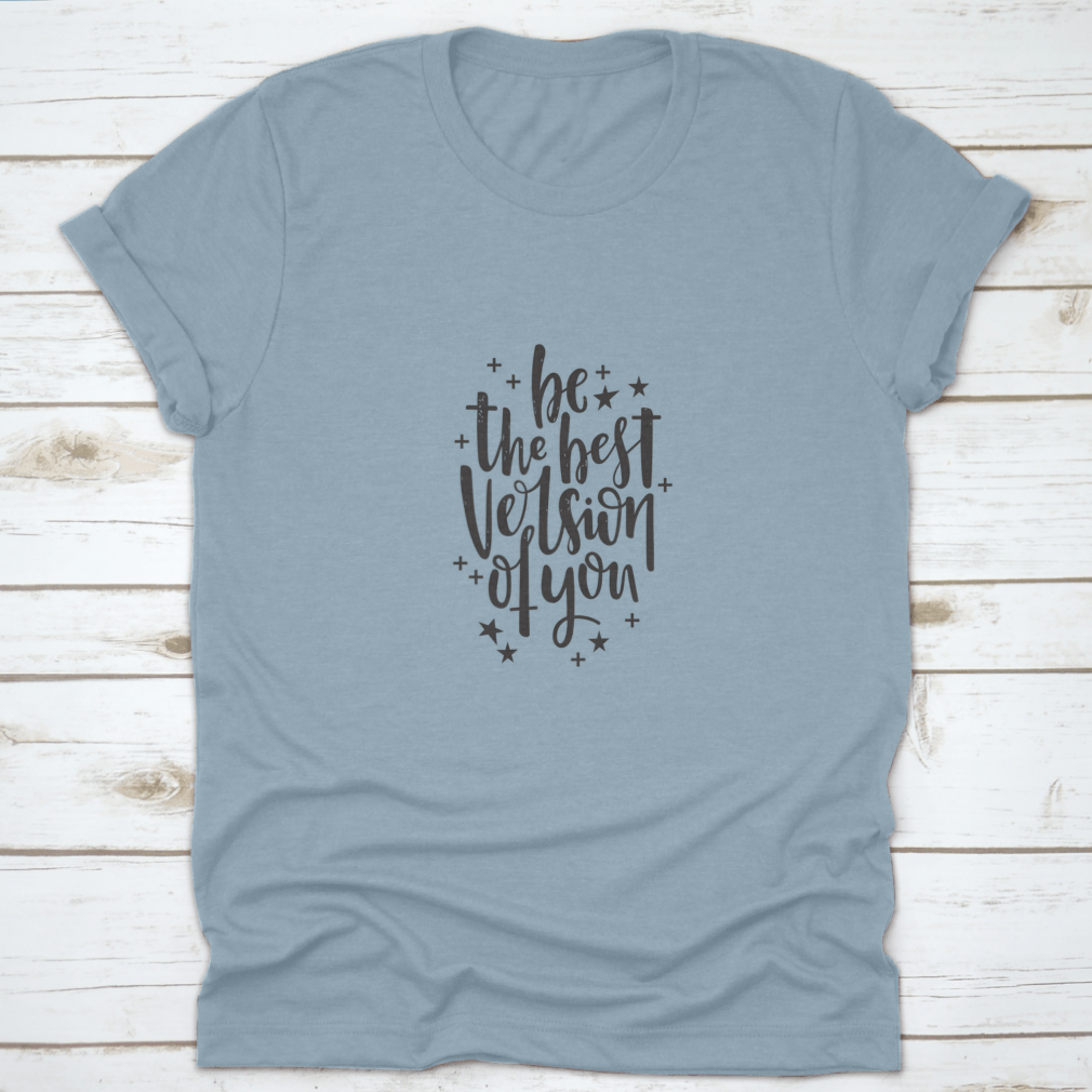 A stylish t-shirt featuring hand-drawn lettering that reads 'Be The Best Version Of You', made from soft cotton fabric.