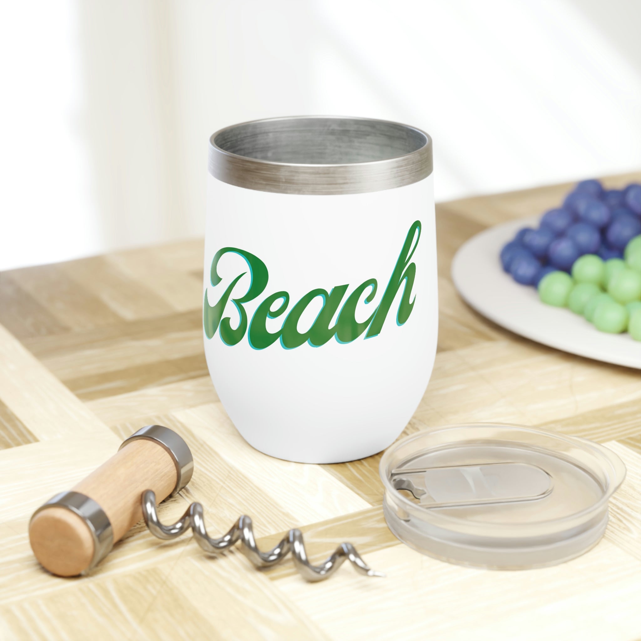 A stylish Beach Chill Wine Tumbler in stainless steel, showcasing its double-insulated design and customizable features, perfect for outdoor use.