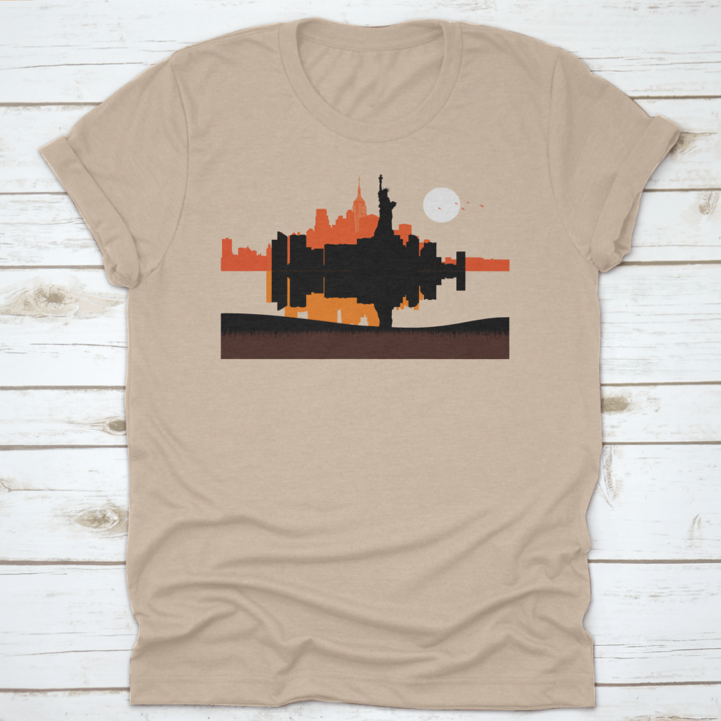 A stylish t-shirt featuring a beautiful sunset design of the Statue of Liberty with New York City skyline in the background.