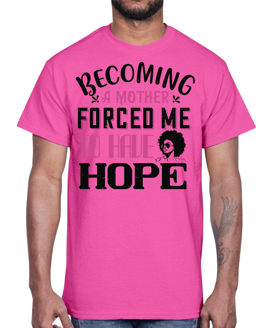 A stylish Afro Cotton Tee featuring the phrase 'Becoming a Mother Forced Me to Have Hope', showcasing its classic fit and soft fabric.