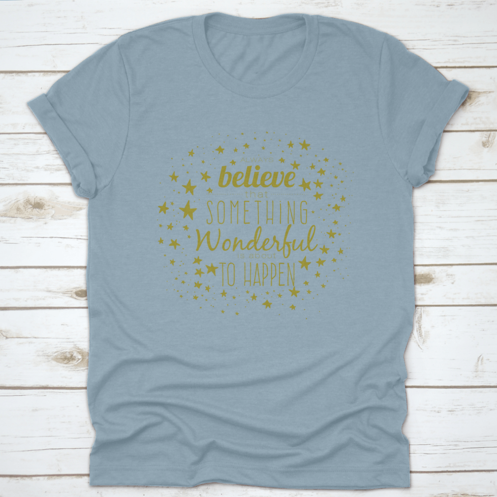 A stylish 'Believe Something Wonderful To Happen' T-shirt made from 100% cotton, featuring a classic fit and motivational design.