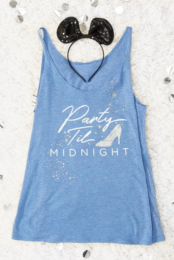 Bibbidi Bobbidi Bride tank top in white with sparkly lettering, and blue tank top with Party 'Til Midnight text, showcasing their flowy fit.