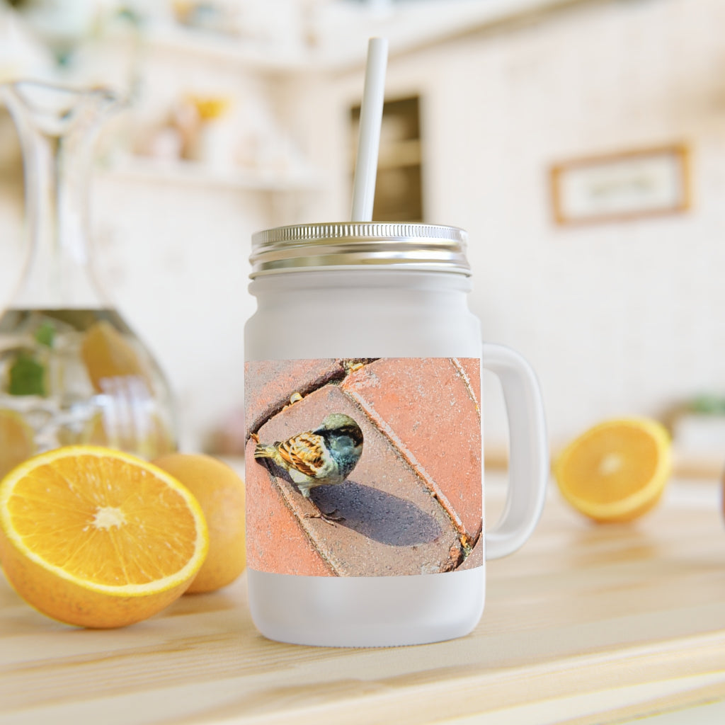 A stylish Bird Mason Jar made of frosted glass, featuring a straw and lid, perfect for personalized drinks.