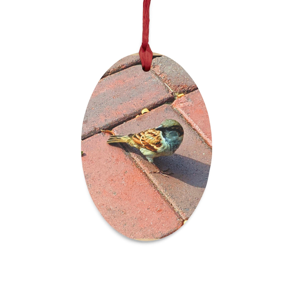 A collection of Bird Wooden Christmas Ornaments in various whimsical shapes, featuring a rustic wood finish and red ribbons for hanging.