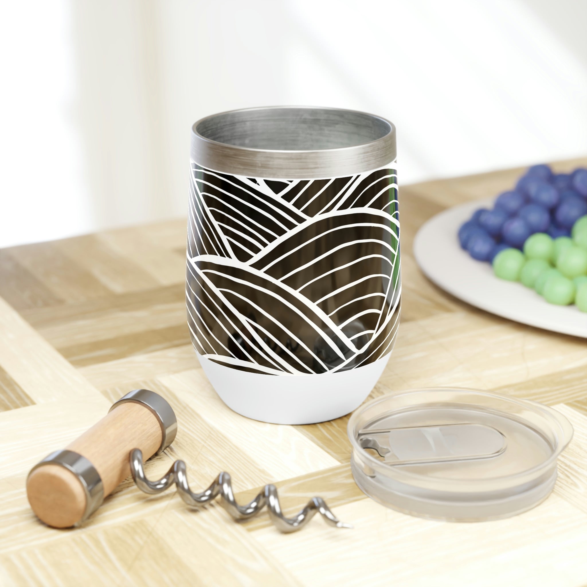 Black and white patterned wine tumbler with double-insulated walls, perfect for maintaining drink temperature.