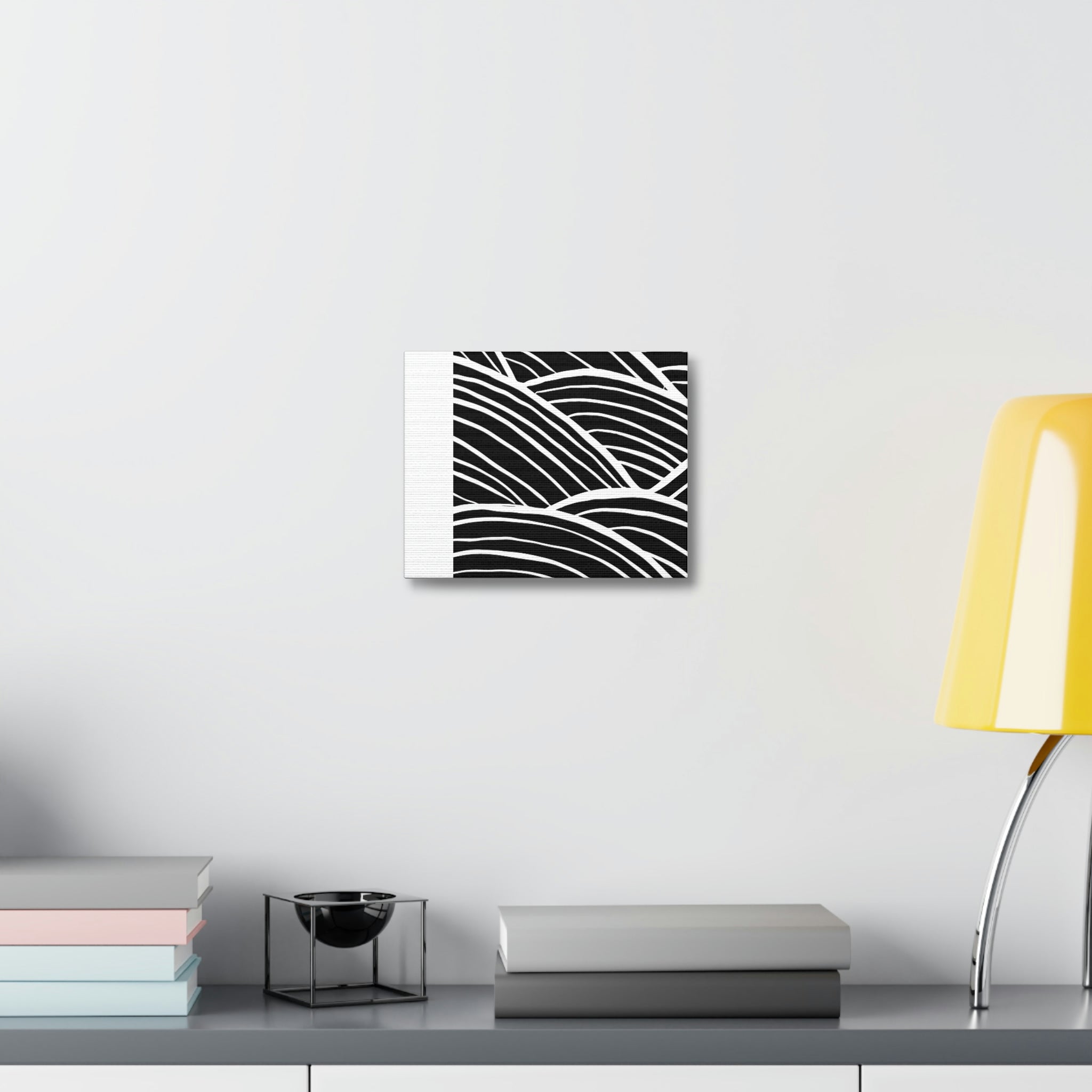 Black and white patterned stretched canvas art piece on a wooden frame, designed for indoor use.