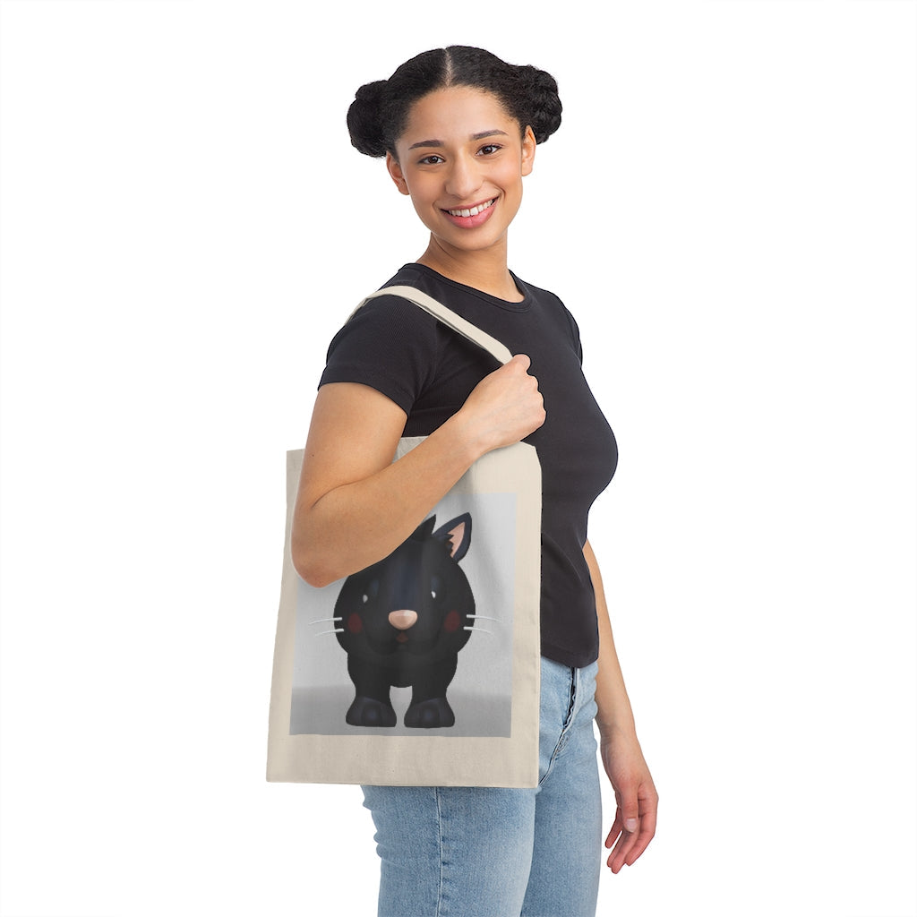 Black Kitty Canvas Tote Bag featuring a stylish design and durable handles, perfect for everyday use.