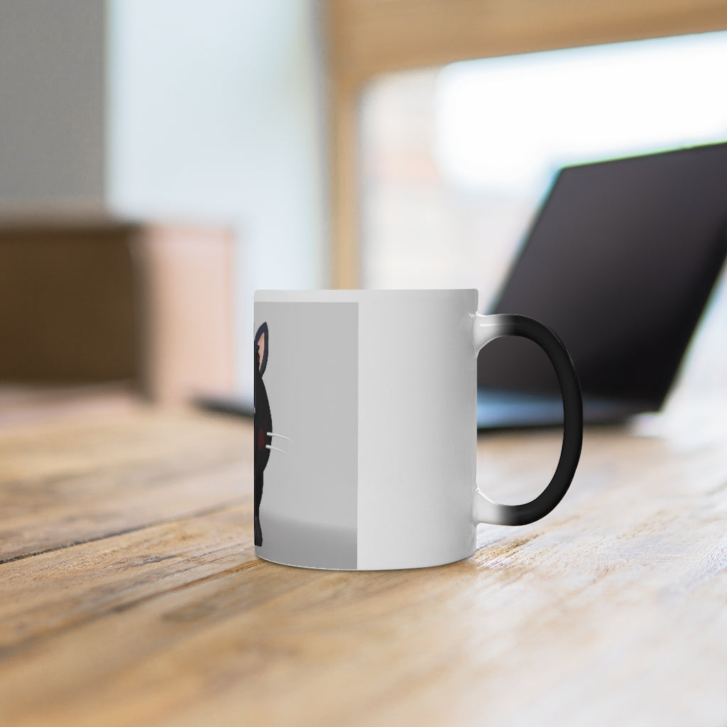 A whimsical black kitty color changing mug showcasing its unique design and color transformation when filled with hot liquid.