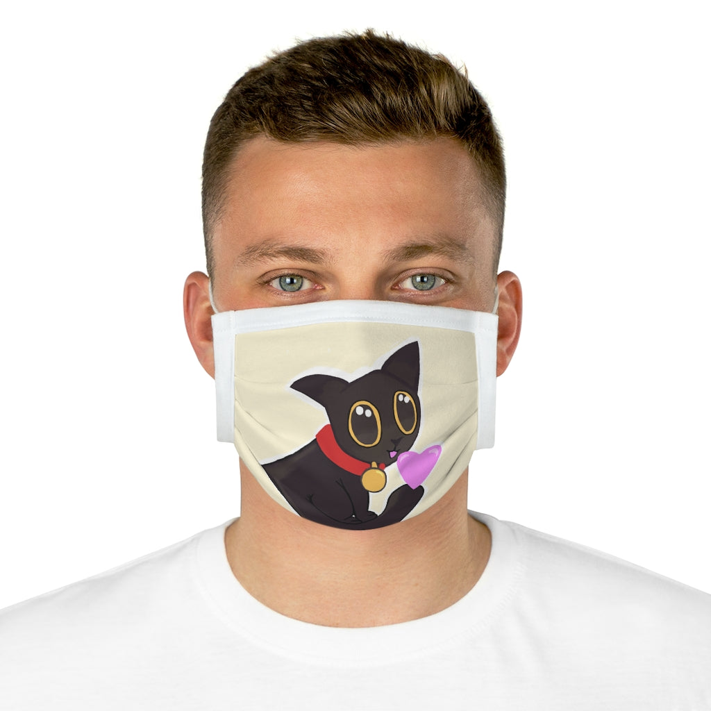 Black Kitty Cotton Face Mask featuring a playful kitty design, made from 100% cotton with adjustable earloops and nose wire.