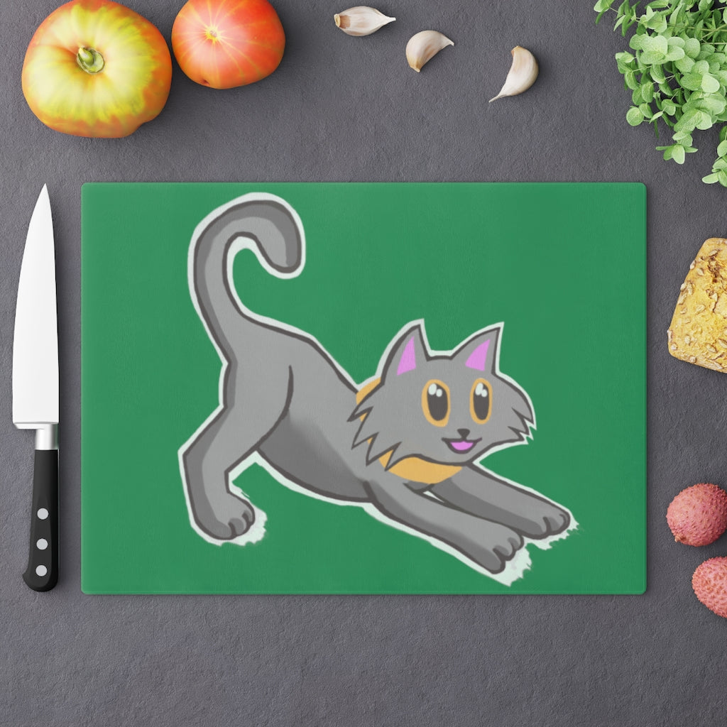 A stylish Black Kitty Cutting Board made of tempered glass, featuring a playful black cat design and four rubber dots for stability.