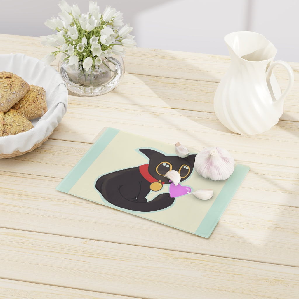 Black Kitty Cutting Board made of tempered glass with rubber dots for stability, featuring a whimsical black kitty design.