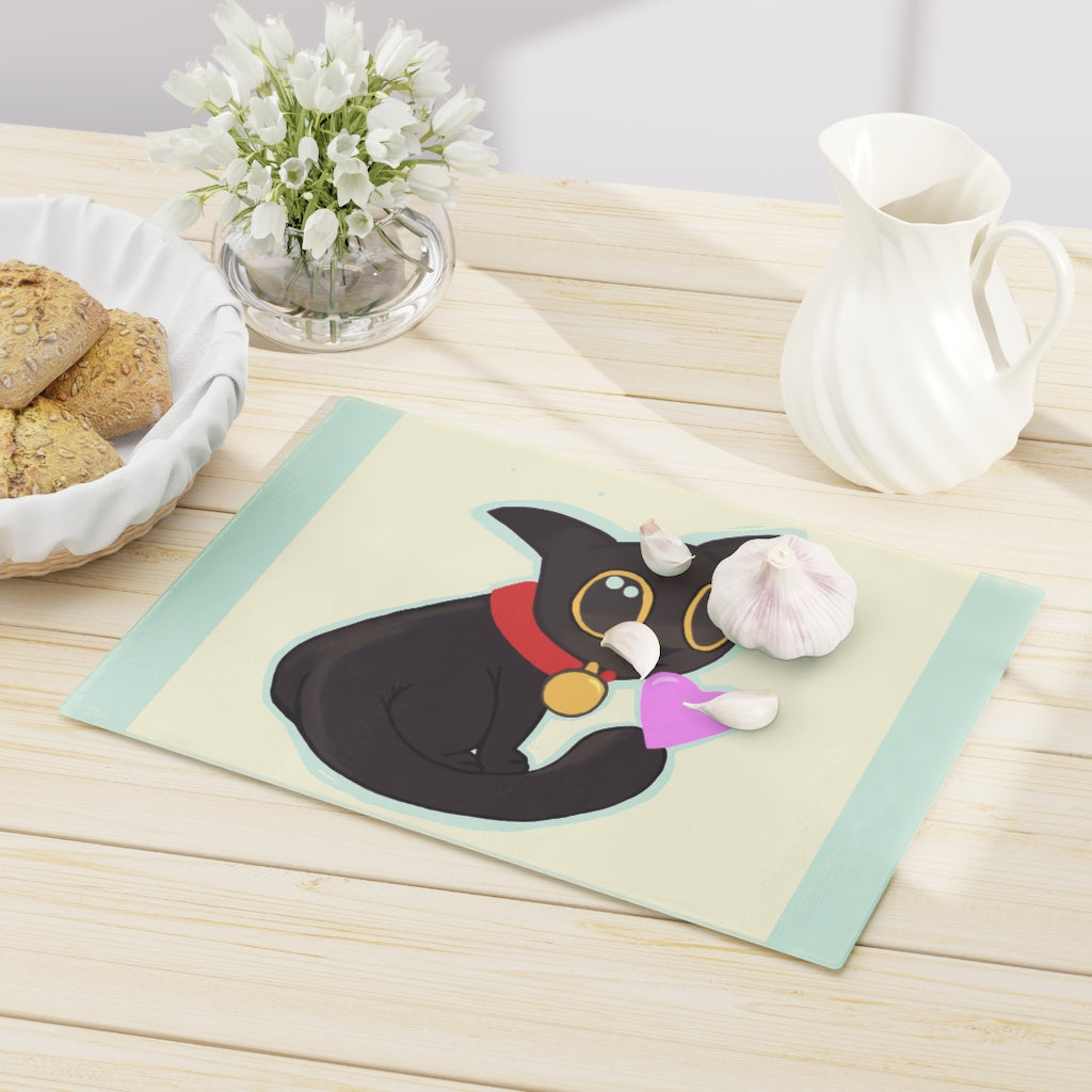 Black Kitty Cutting Board made of tempered glass with rubber dots for stability, featuring a whimsical black kitty design.