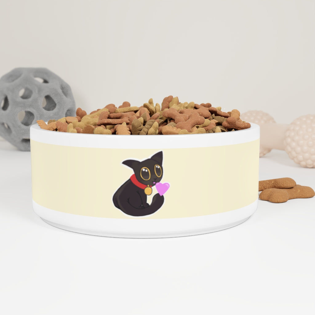 A stylish black ceramic pet bowl featuring a cute kitty design, perfect for feeding cats and small dogs.