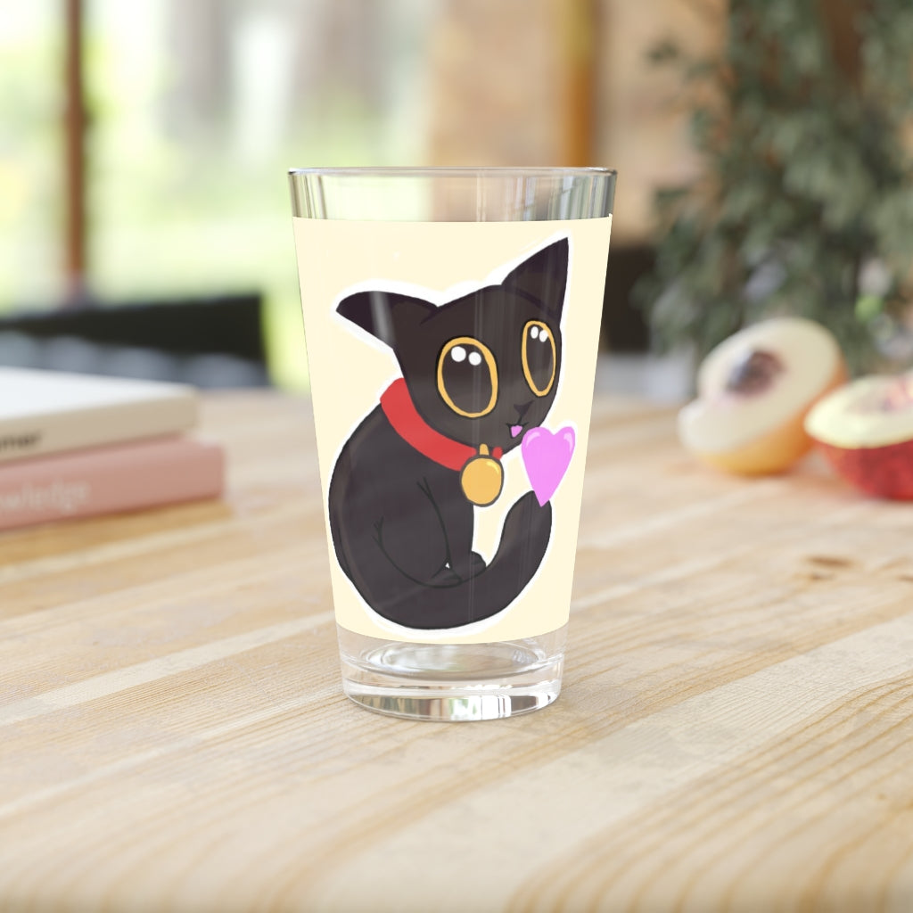 A clear 16oz pint glass featuring a black kitty design, perfect for personalized beverages.