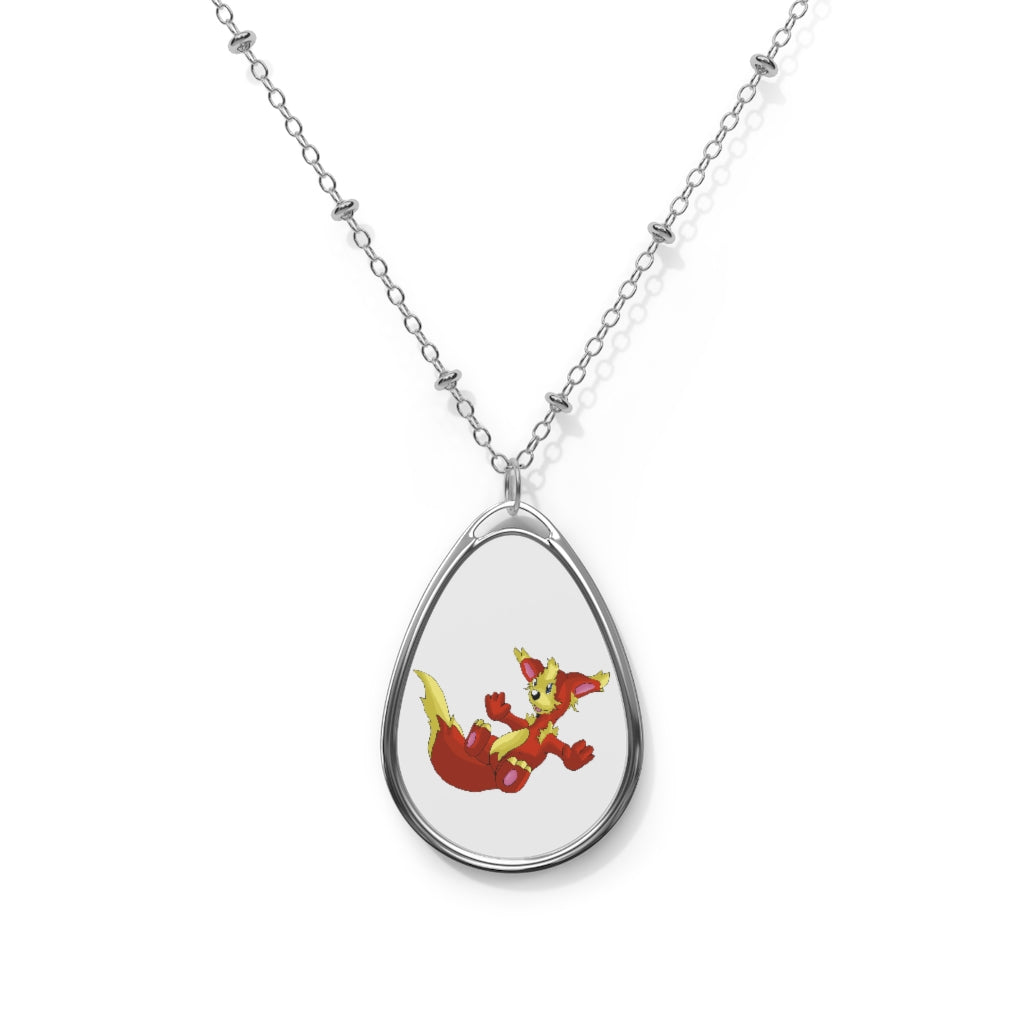 Blazeon Oval Necklace featuring a unique ellipse-shaped brass pendant and chain, showcasing a vibrant aluminum print panel.