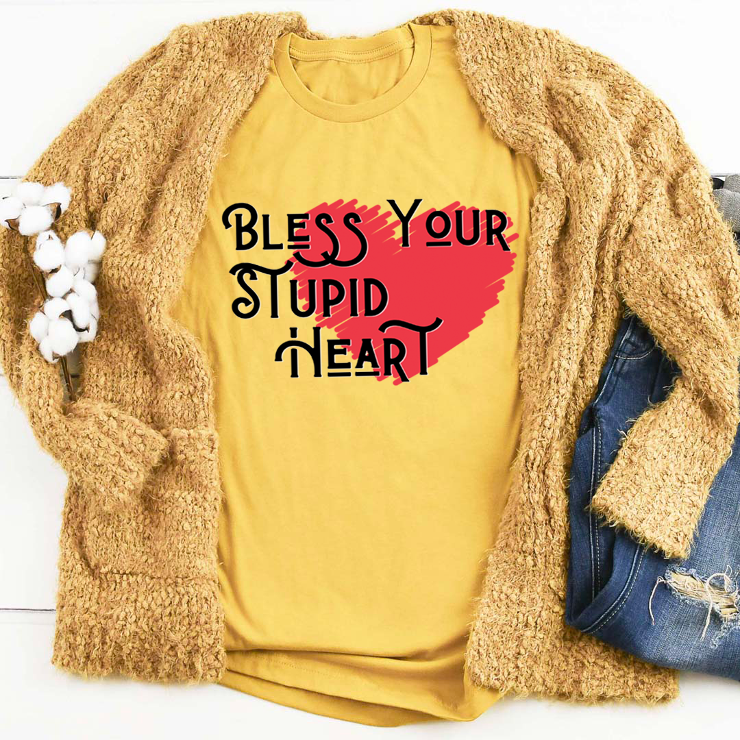 A comfortable and stylish Bless Your Stupid Heart T-Shirt made from soft ring-spun cotton, featuring double stitching for durability.