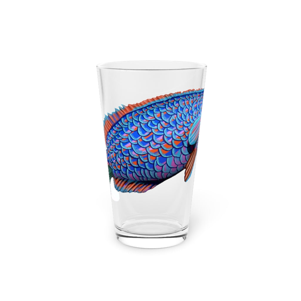 A clear 16oz pint glass featuring a vibrant blue and purple fish design, perfect for enjoying beverages.