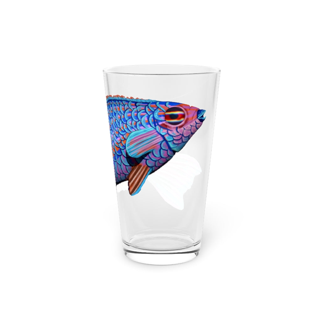 A clear 16oz pint glass featuring a vibrant blue and purple fish design, perfect for enjoying beverages.