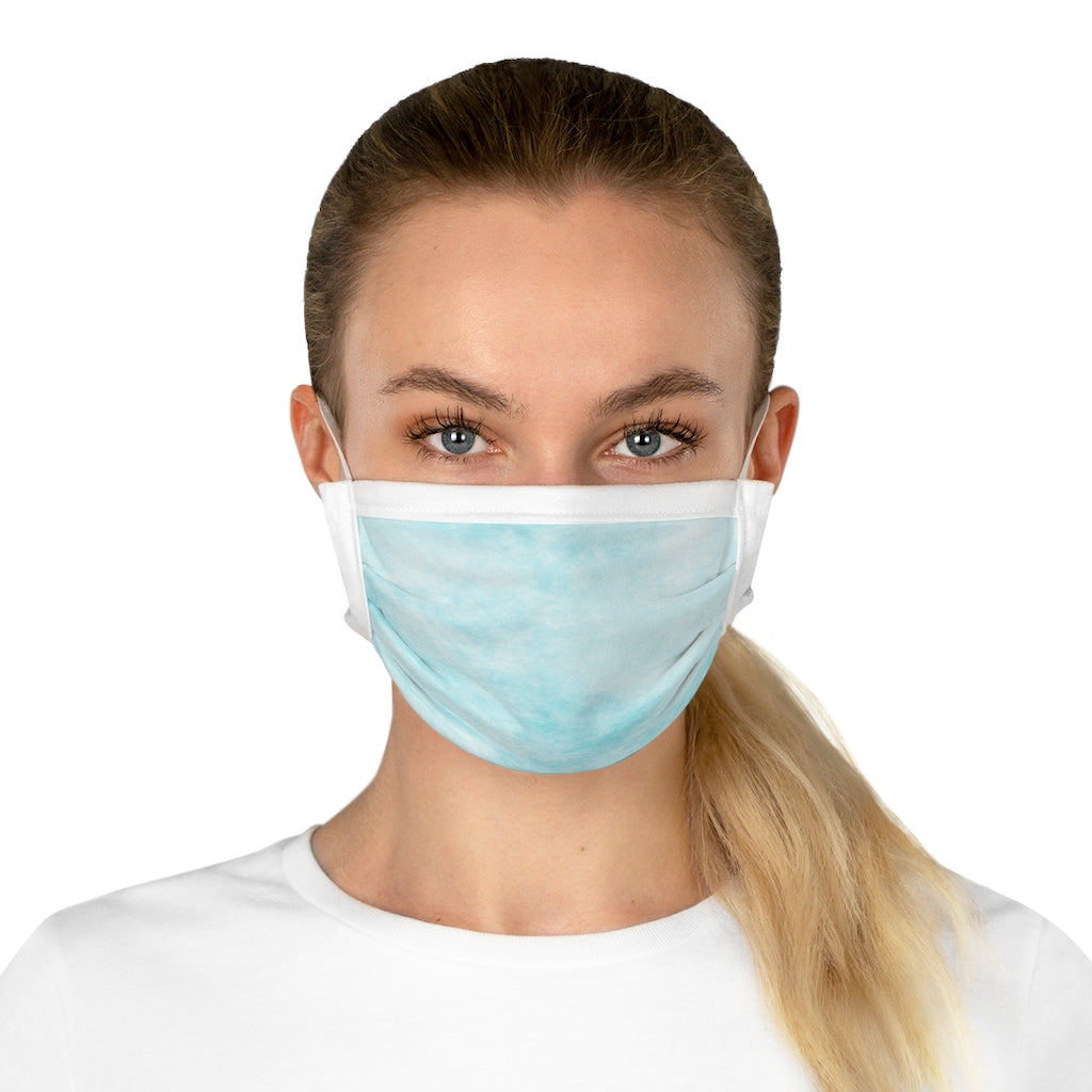 Blue Clouds Cotton Face Mask featuring a stylish cloud design, made from 100% cotton with adjustable earloops and nose wire.