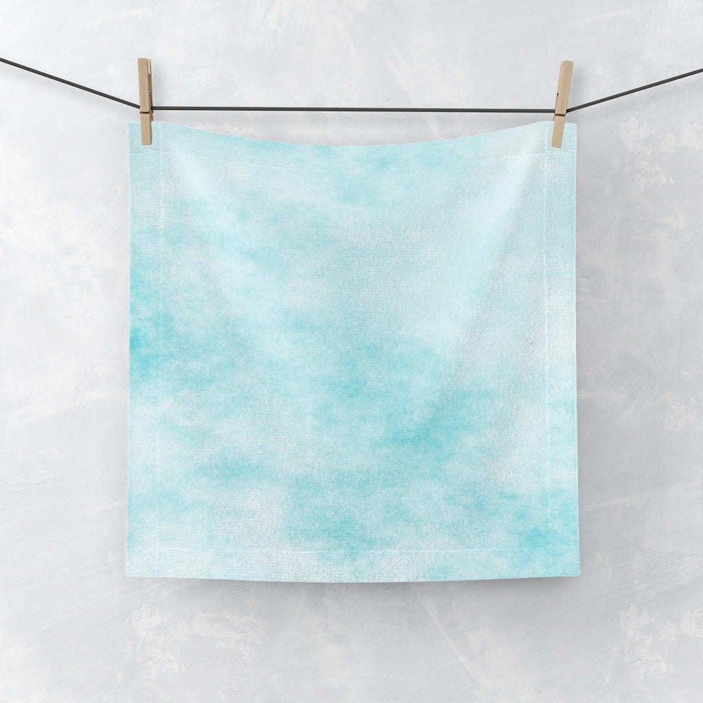 Blue Clouds Face Towel featuring a vibrant custom design on a soft polyester blend front and absorbent cotton back.