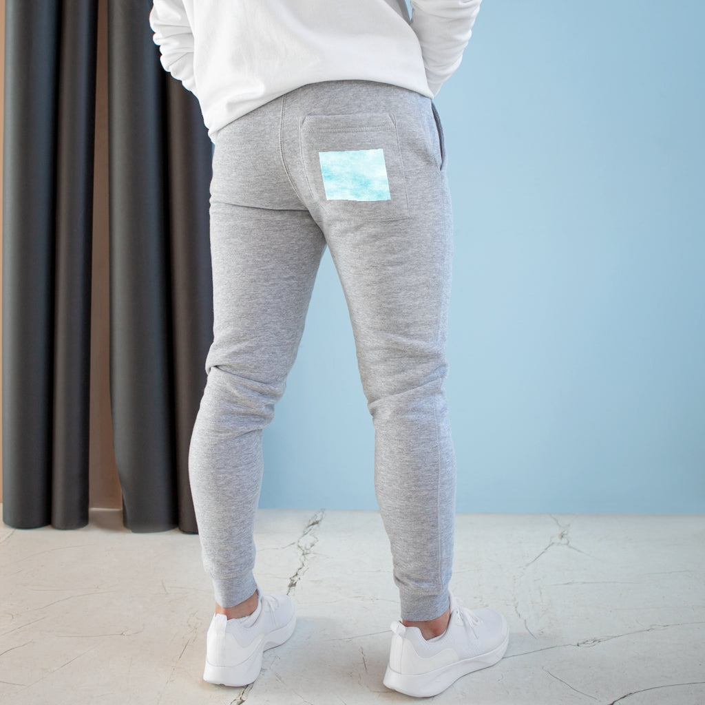 Blue Clouds Premium Fleece Joggers featuring a customizable back pocket and two side pockets, made from soft fleece fabric.