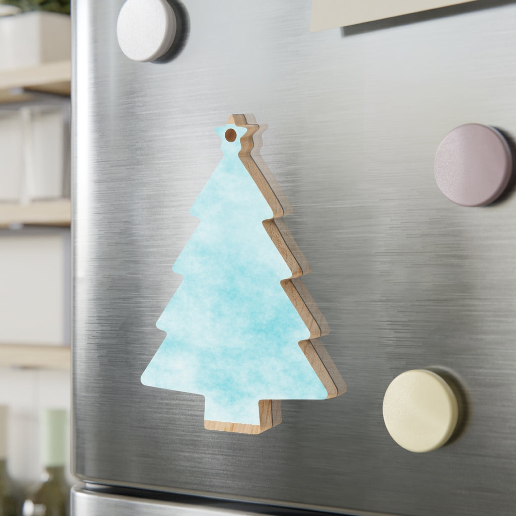 A collection of Blue Clouds Wooden Christmas Ornaments in various whimsical shapes, featuring a rustic wood finish and red ribbons for hanging.