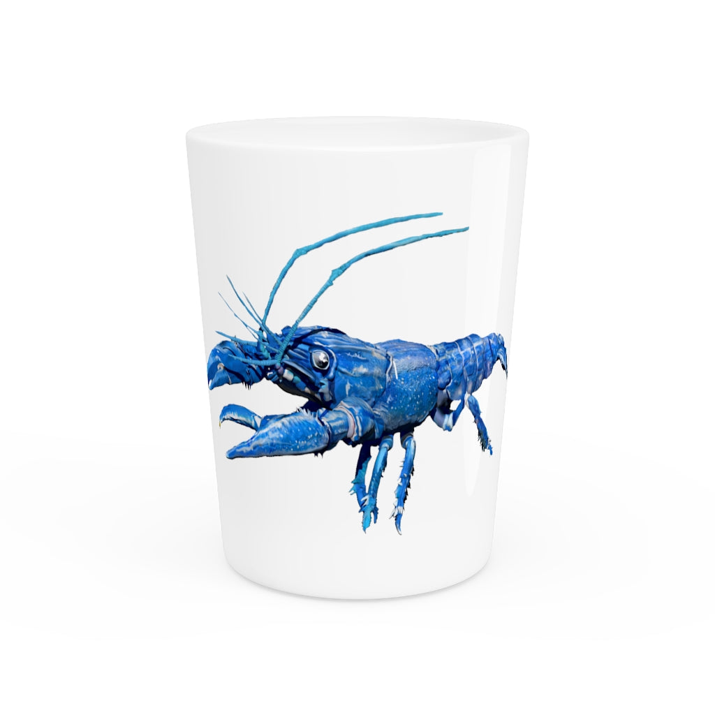 A personalized Blue Crawfish Shot Glass with a ceramic finish, available in white or black interior, perfect for gatherings and gifts.