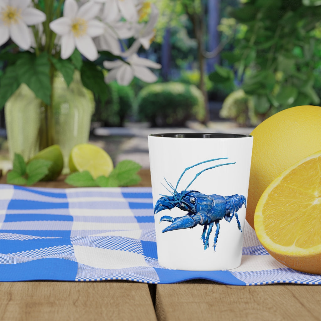 A personalized Blue Crawfish Shot Glass with a ceramic finish, available in white or black interior, perfect for gatherings and gifts.