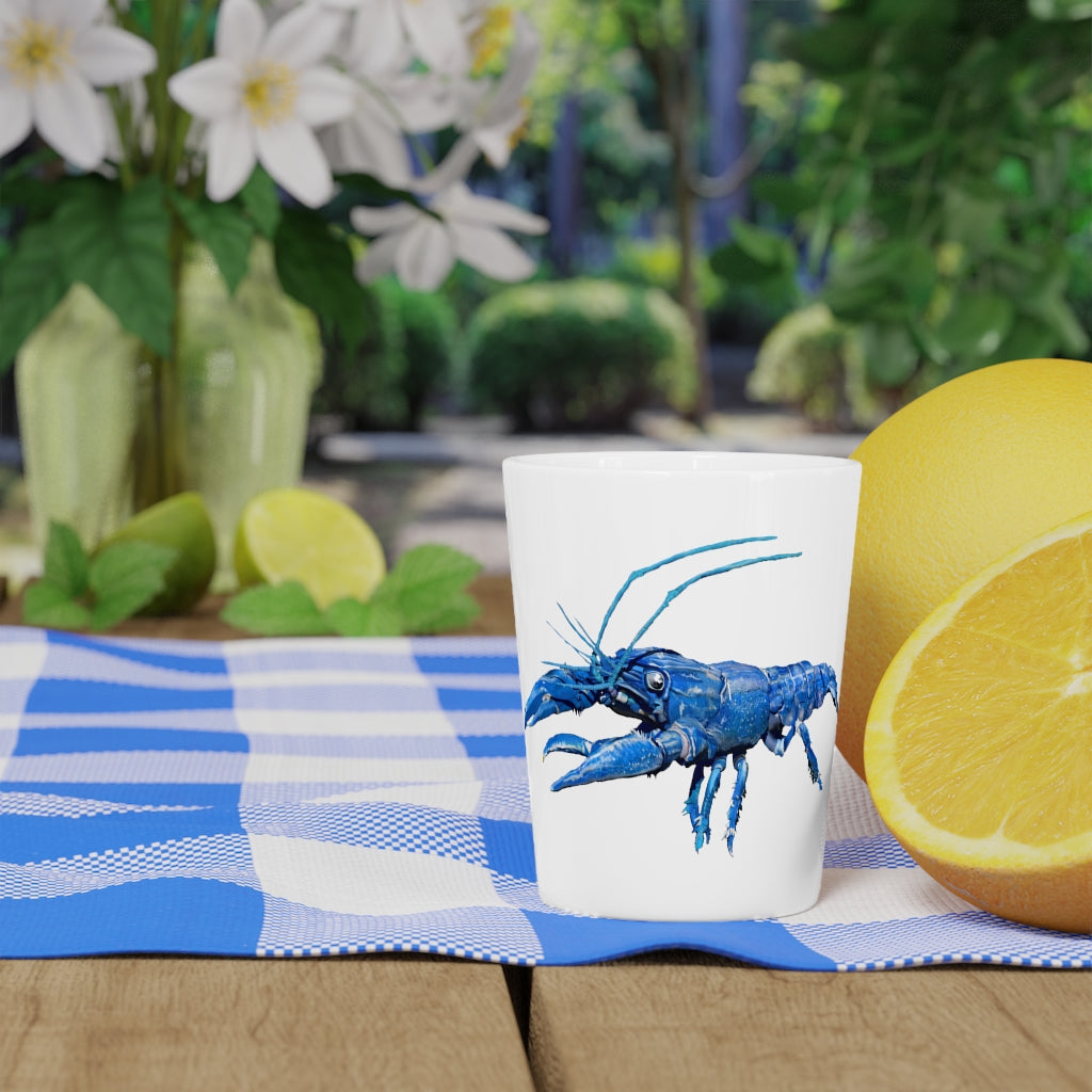 A personalized Blue Crawfish Shot Glass with a ceramic finish, available in white or black interior, perfect for gatherings and gifts.