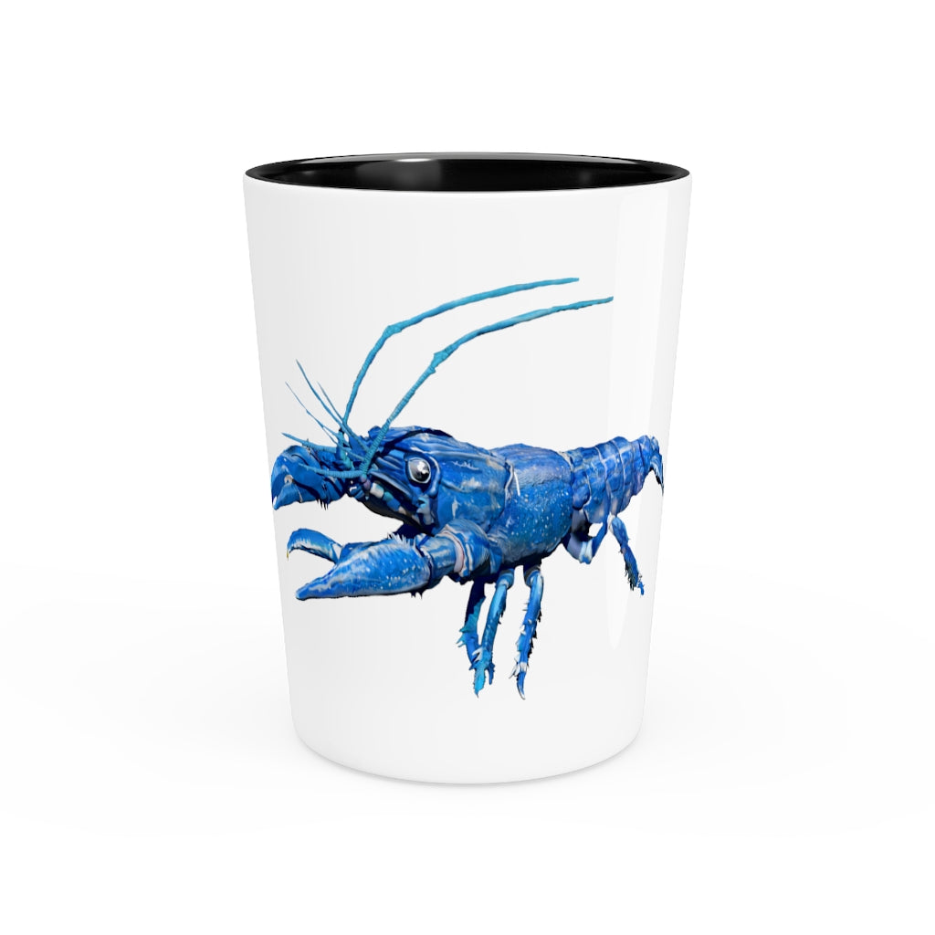 A personalized Blue Crawfish Shot Glass with a ceramic finish, available in white or black interior, perfect for gatherings and gifts.