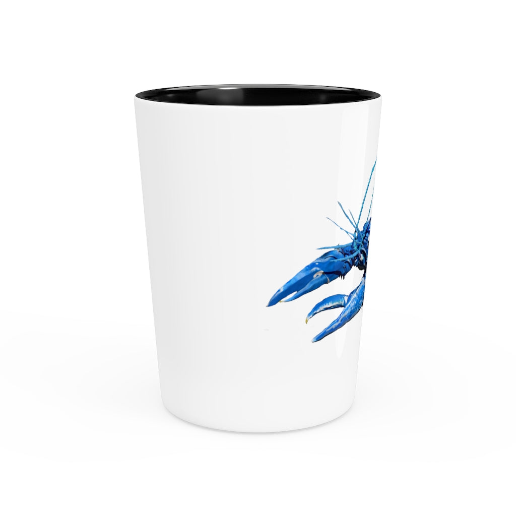 A personalized Blue Crawfish Shot Glass with a ceramic finish, available in white or black interior, perfect for gatherings and gifts.