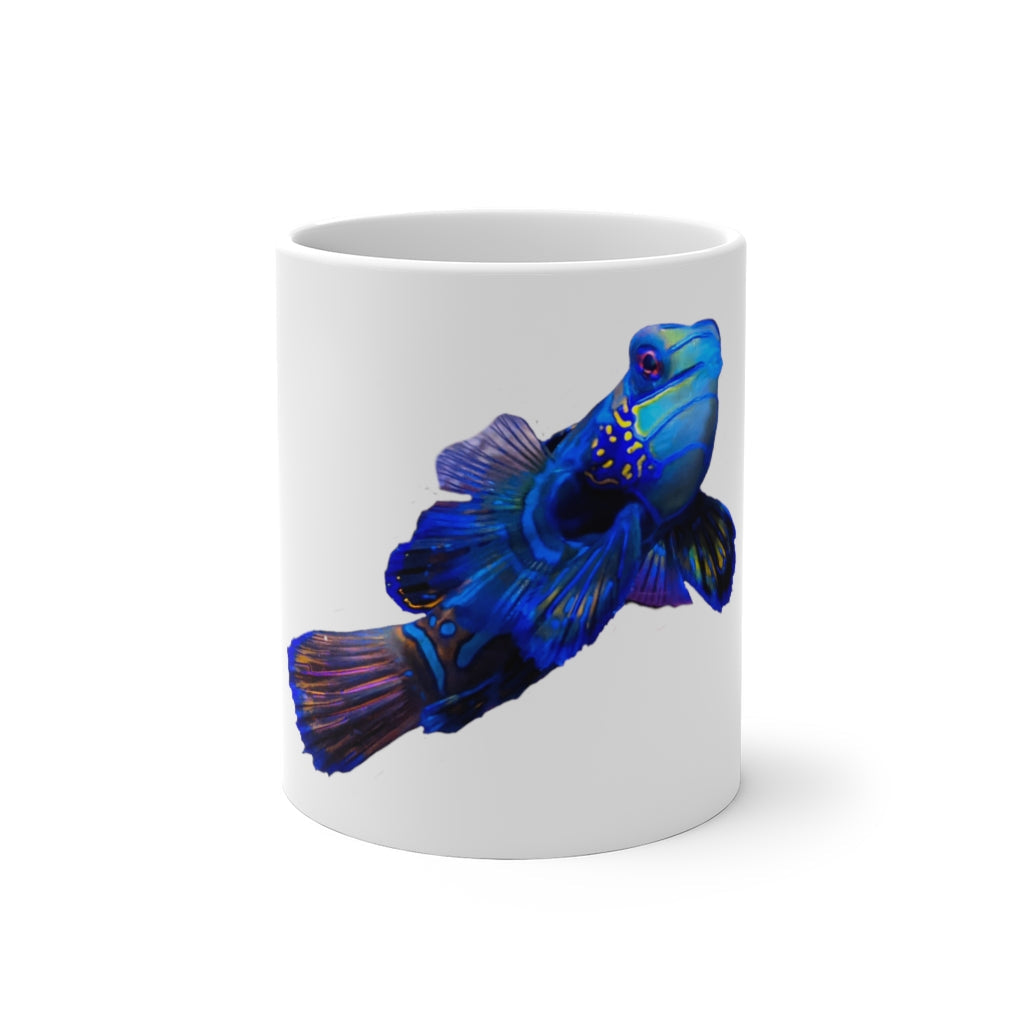 A blue fish color changing mug showcasing vibrant colors when filled with hot liquid, featuring a rounded design and C-handle.