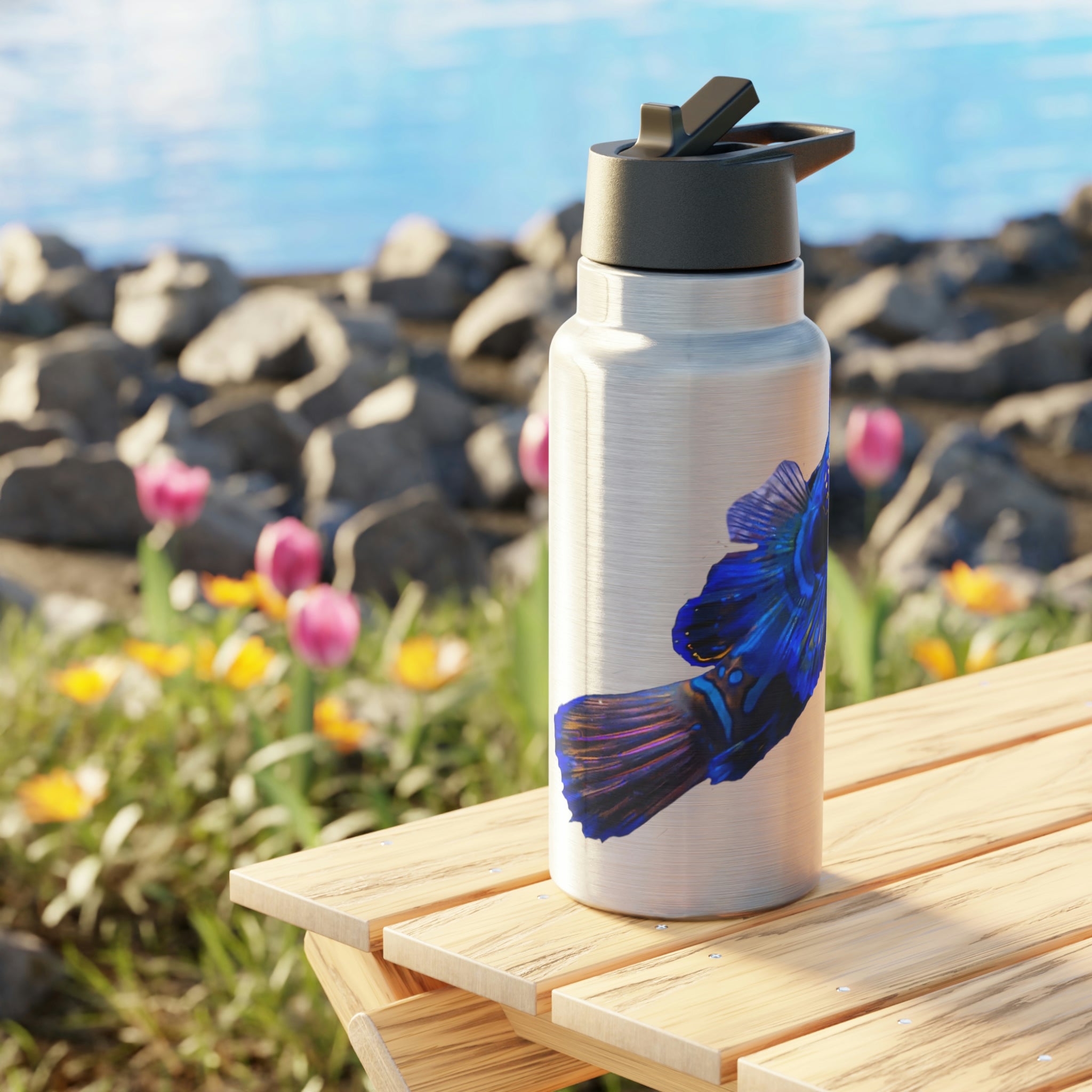 Blue Fish Gator Tumbler, 32oz, stainless steel with a black screw-on cap and plastic straw, showcasing a customizable design.