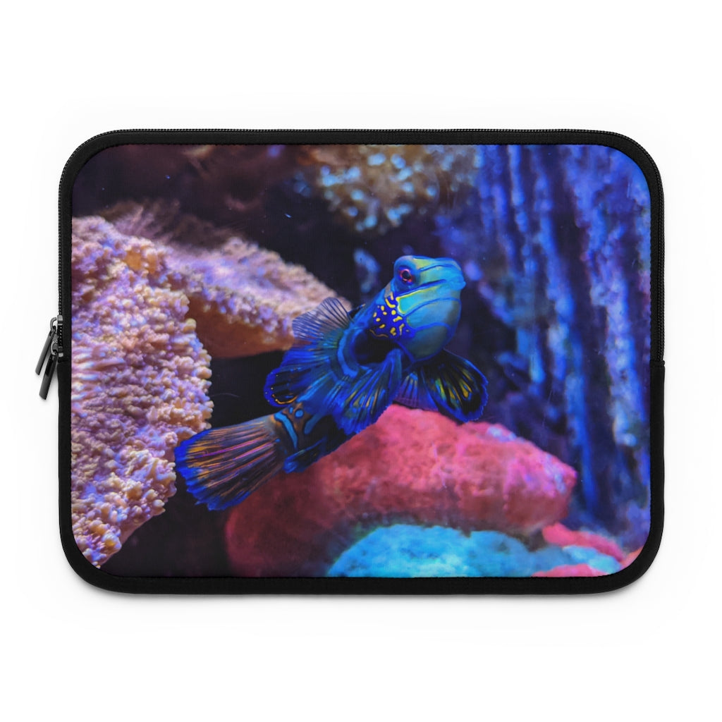 Blue Fish Laptop Sleeve featuring a vibrant fish design on the front and a solid black back, made from smooth neoprene material.