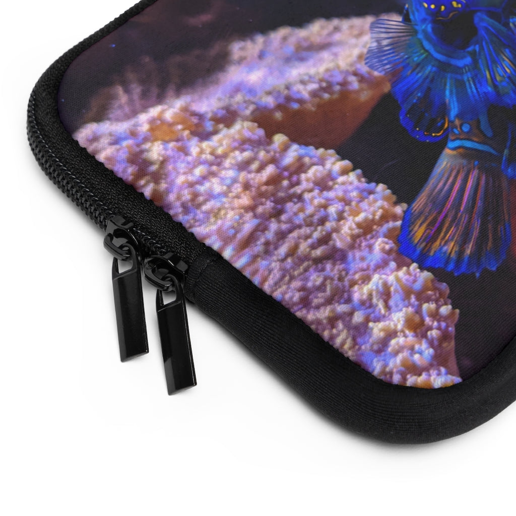 Blue Fish Laptop Sleeve featuring a vibrant fish design on the front and a solid black back, made from smooth neoprene material.