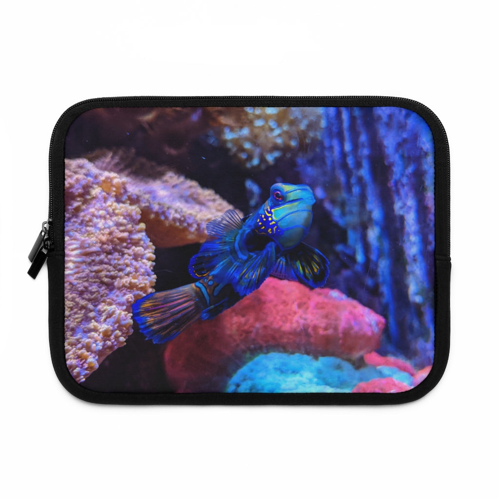 Blue Fish Laptop Sleeve featuring a vibrant fish design on the front and a solid black back, made from smooth neoprene material.