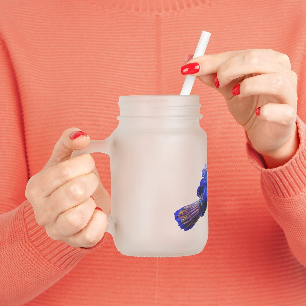 A stylish Blue Fish Mason Jar made of frosted glass, featuring a straw and lid, perfect for personalized drinks.