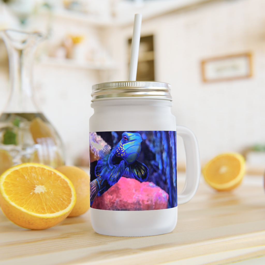 A stylish Blue Fish Mason Jar made of frosted glass, featuring a straw and lid, perfect for personalized drinks.