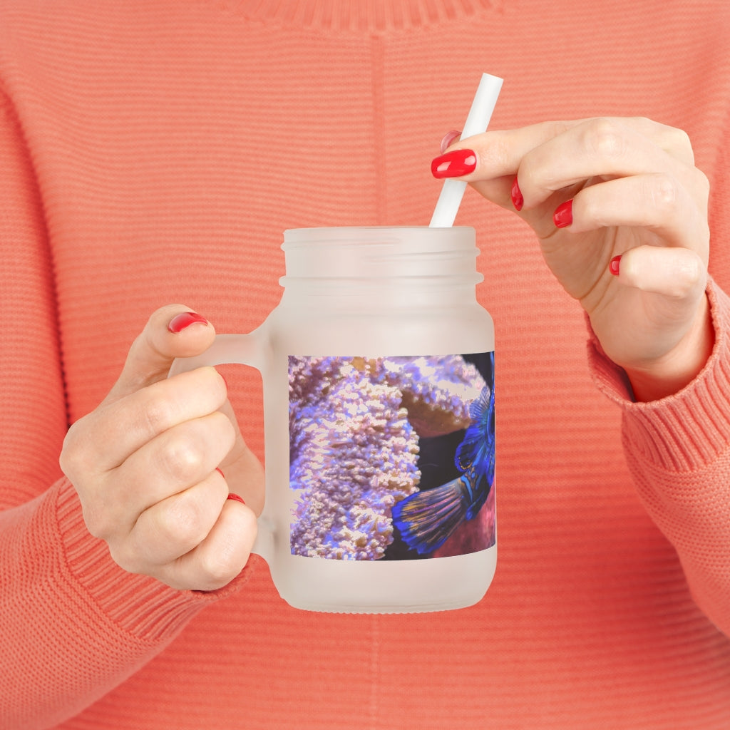 A stylish Blue Fish Mason Jar made of frosted glass, featuring a straw and lid, perfect for personalized drinks.