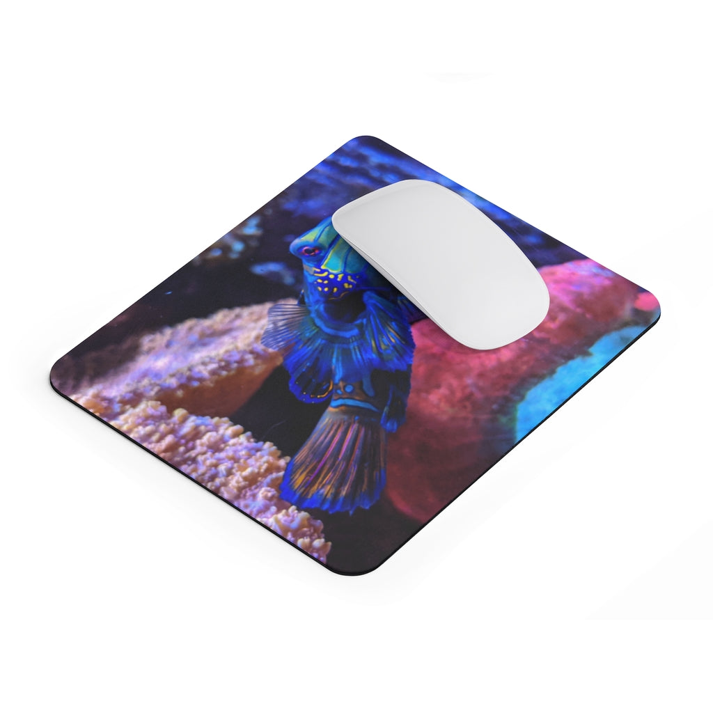 Blue Fish Mouse Pad featuring vibrant fish design on a smooth neoprene surface, ideal for enhancing desk aesthetics.