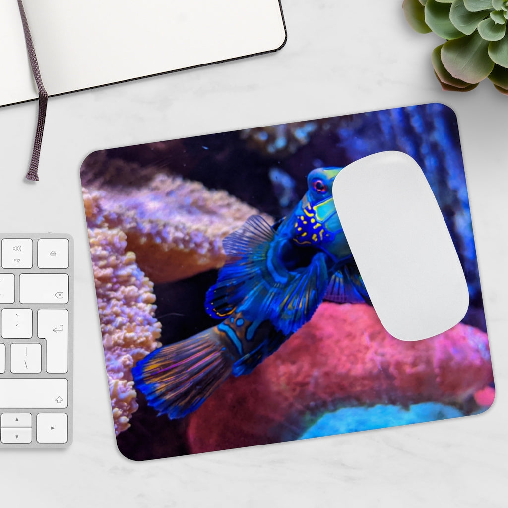 Blue Fish Mouse Pad featuring vibrant fish design on a smooth neoprene surface, ideal for enhancing desk aesthetics.