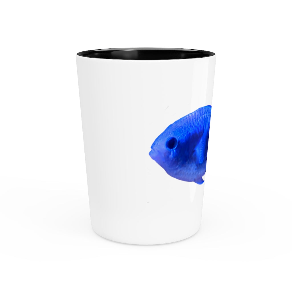 A stylish Blue Fish Shot Glass made of white ceramic with a customizable design, featuring a black interior.