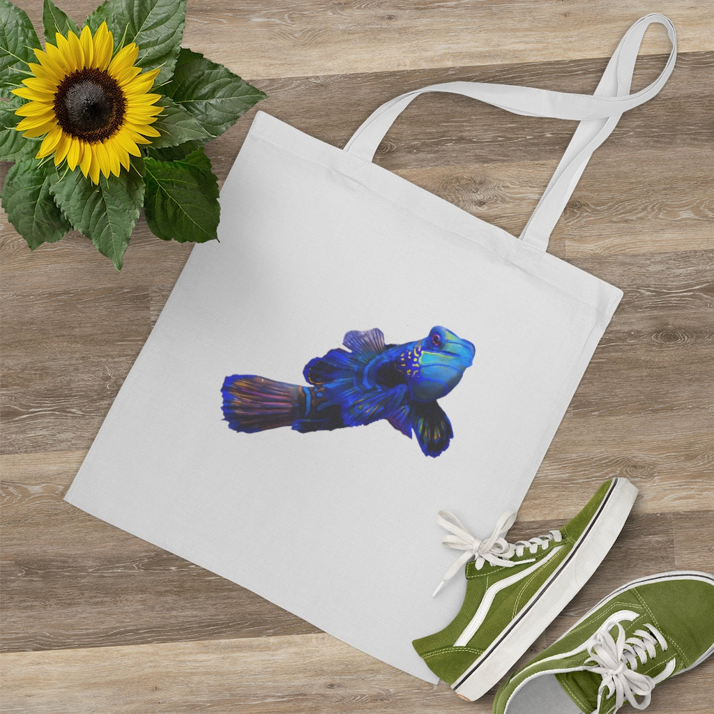 Blue Fish Tote Bag made of 100% cotton with long handles and cross stitching for added stability, featuring vibrant colors.