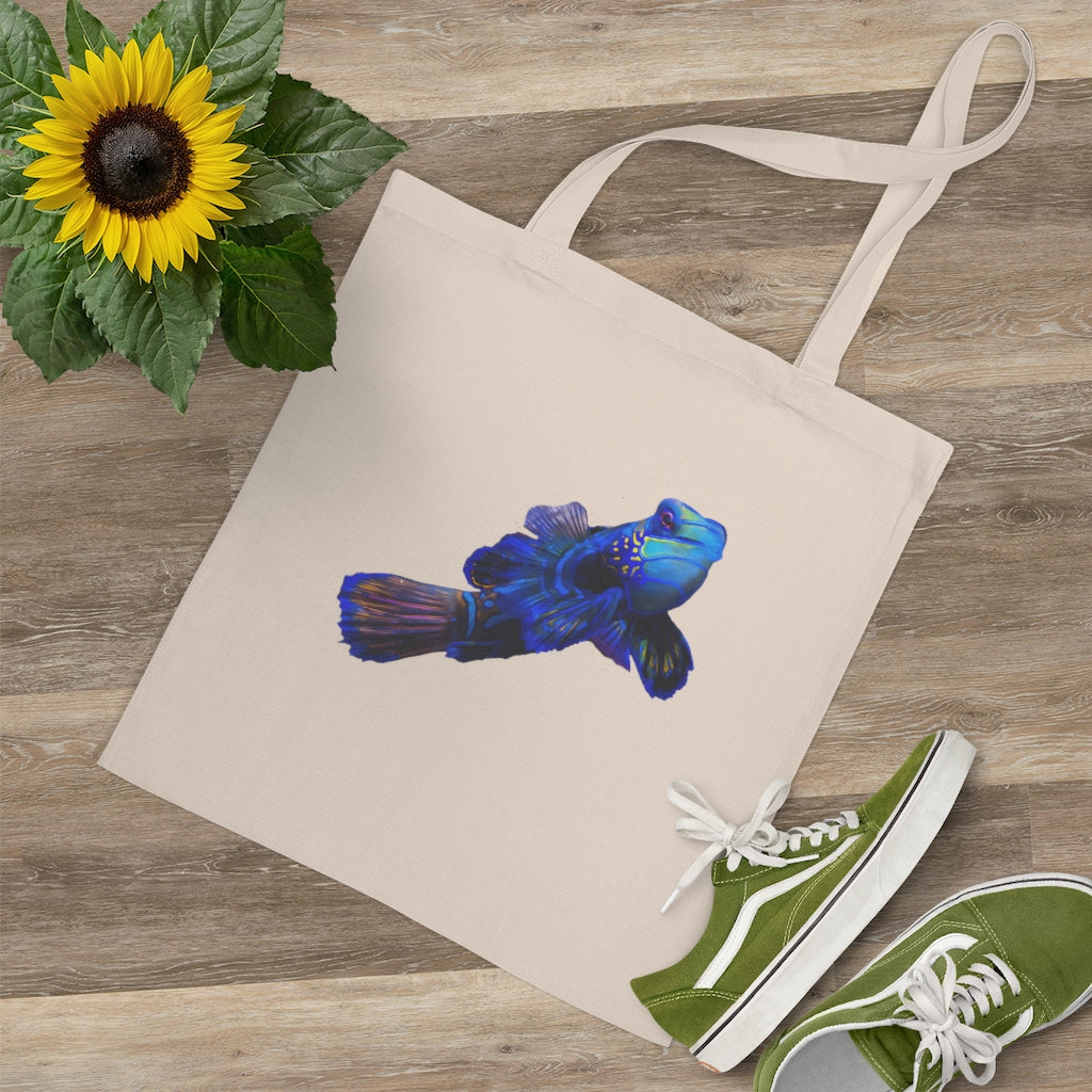 Blue Fish Tote Bag made of 100% cotton with long handles and cross stitching for added stability, featuring vibrant colors.