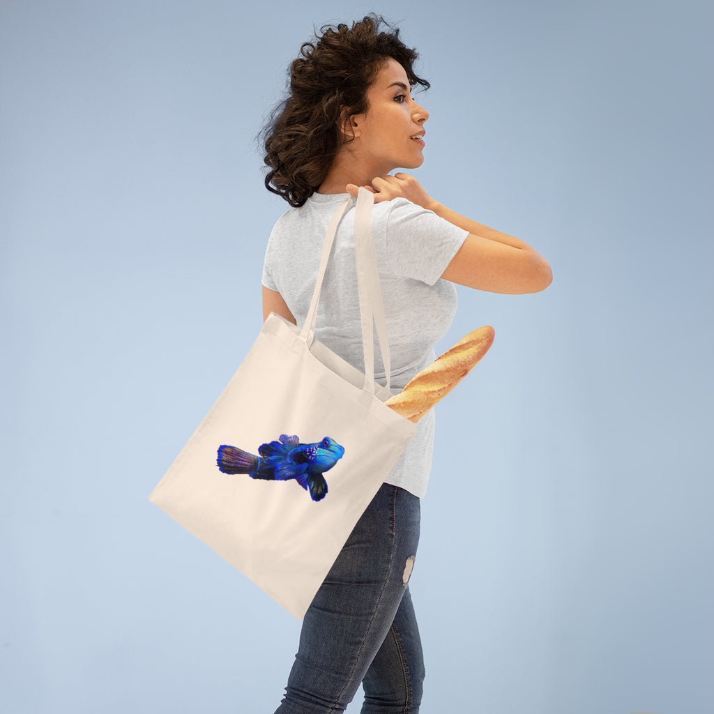 Blue Fish Tote Bag made of 100% cotton with long handles and cross stitching for added stability, featuring vibrant colors.