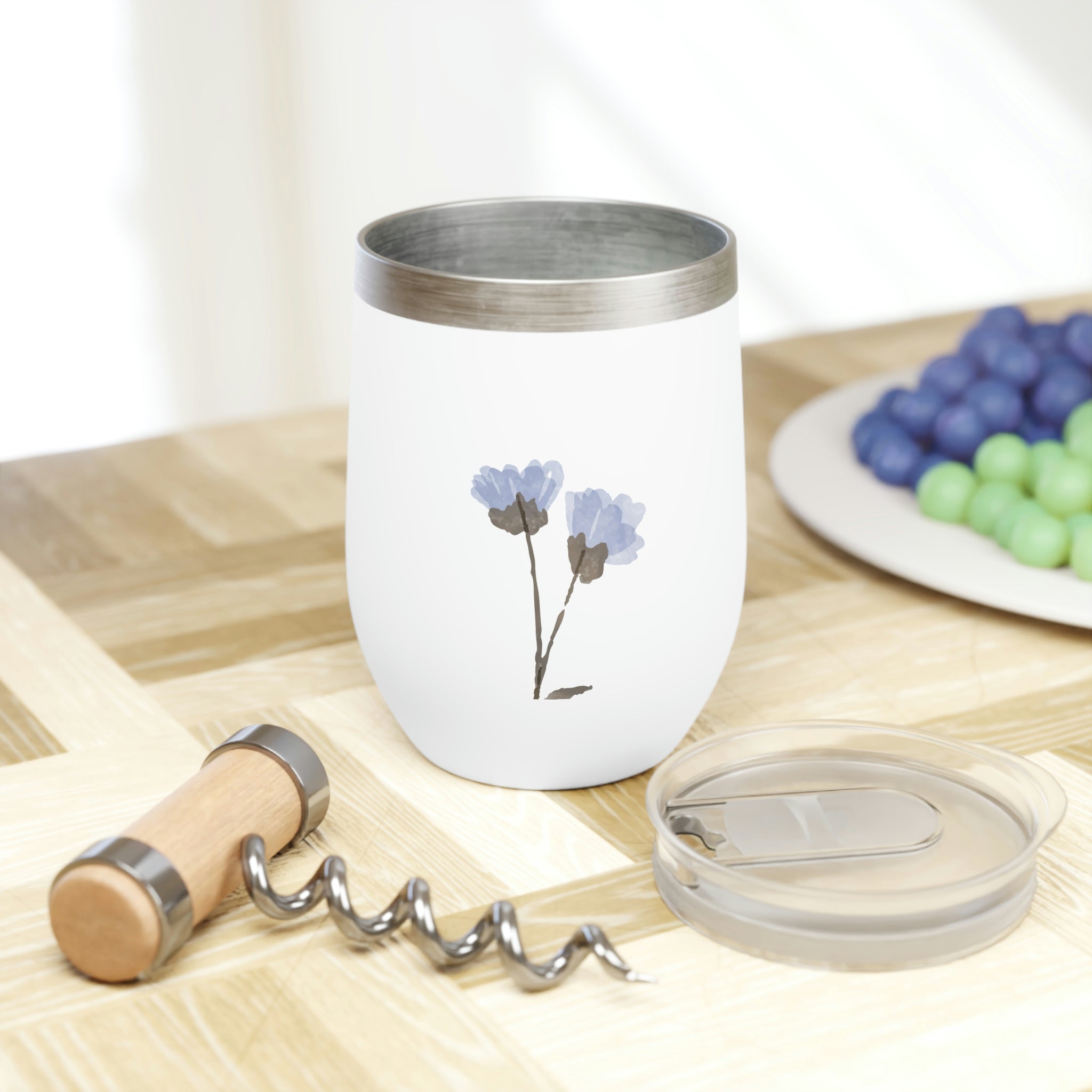 A stylish Blue Flowers Chill Wine Tumbler showcasing a floral design, perfect for enjoying wine at the ideal temperature.