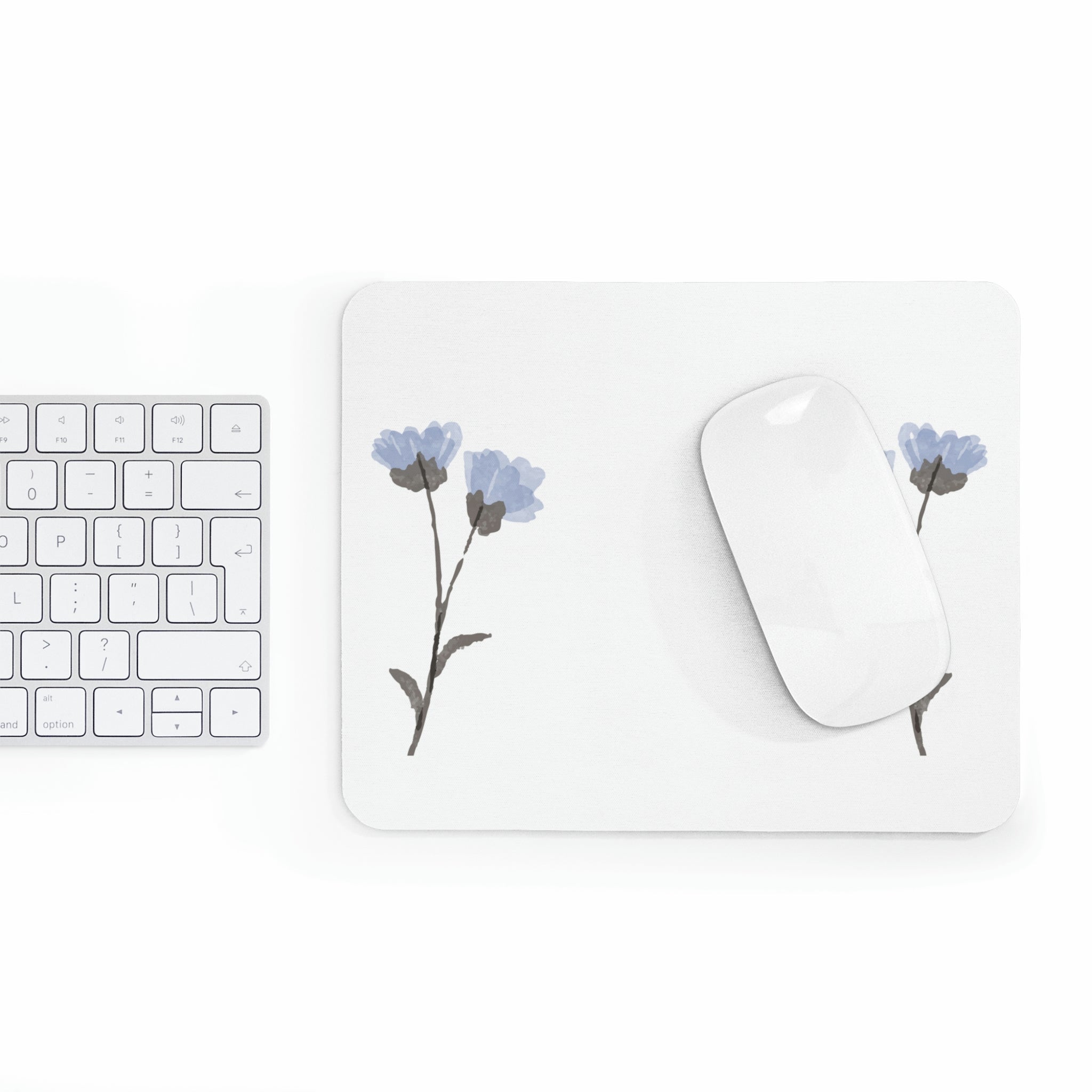 A vibrant blue flowers mouse pad with a soft surface and non-slip rubber base, perfect for enhancing any workspace.